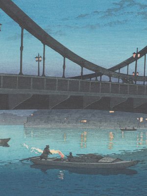 Small, hand rowed boats float on the rippling waters that reflect the lights of the city ashore, and the stretch of bridge above.